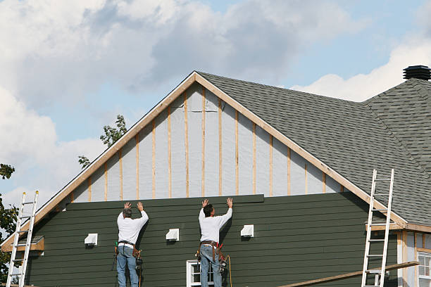 Professional Siding Repair technician working in Botkins, OH